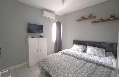 Tangerang Apartment | Guest Rated Kuro House at Aeropolis - Your Ideal Getaway
