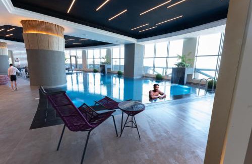 Salmiya Hotel | Discover Kuwait Grand Hotel: Oceanfront Retreat with Spa