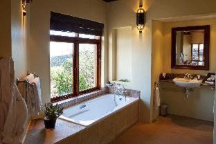 Blue Crane Route Cabin | Discover Kuzuko Lodge: Oceanfront Retreat with Spa & Pool
