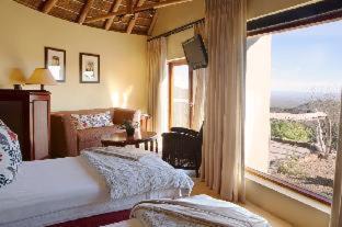 Blue Crane Route Cabin | Discover Kuzuko Lodge: Oceanfront Retreat with Spa & Pool