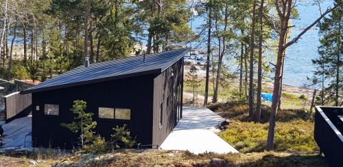 Grisslehamn Cabin | Oceanfront Kvarnsands Strandstugor: Guest Rated 9.5/10