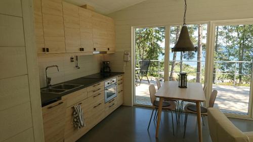 Grisslehamn Cabin | Oceanfront Kvarnsands Strandstugor: Guest Rated 9.5/10