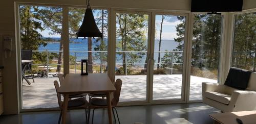 Grisslehamn Cabin | Oceanfront Kvarnsands Strandstugor: Guest Rated 9.5/10