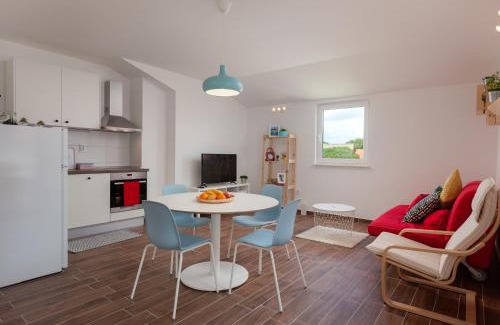Zadvarje Apartment | Discover Kvasina Apartments: Oceanfront Retreat Rated 9.9