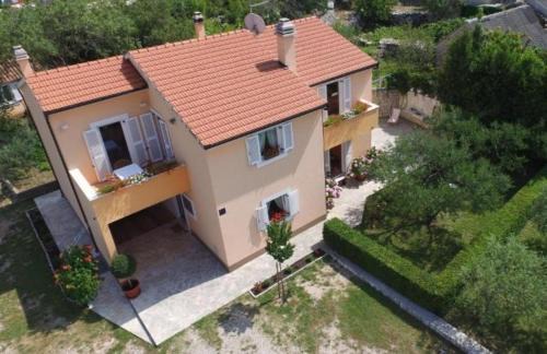 Zadvarje Apartment | Discover Kvasina Apartments: Oceanfront Retreat Rated 9.9
