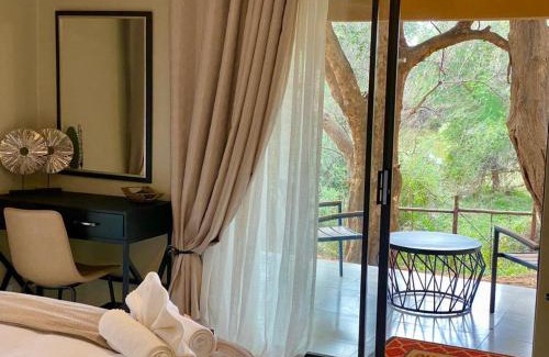 Waterberg District House | Relax at Kwa Nokeng Lodge with Breakfast & Family Amenities