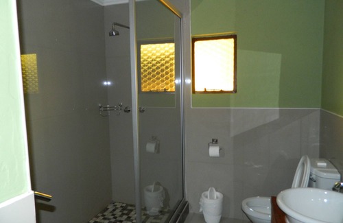 Kasane Cabin | Discover Kwalape Safari Lodge: Pool, Spa & Family-Friendly