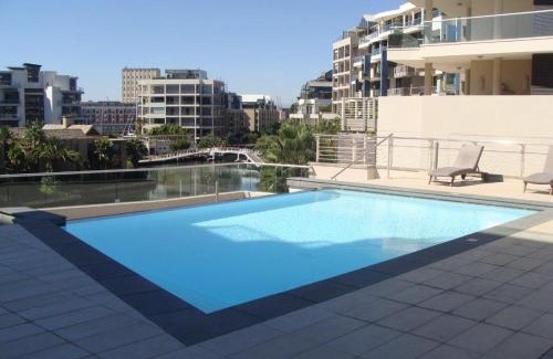 Victoria and Alfred Waterfront Apartment | Discover Kylemore 405 B: Family-Friendly with Pool Access