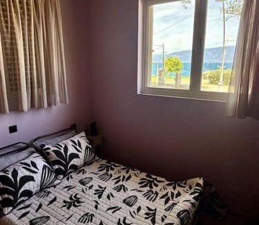 Aigio Apartment | Experience KYMA: Nature, History & Family-Friendly Comfort