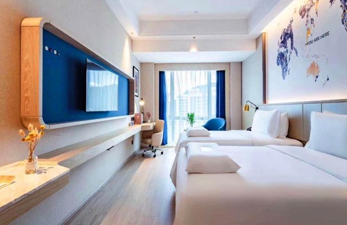 Hantai District Hotel | Discover Kyriad Hanzhong Railway Station: Family-Friendly Stays