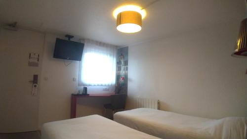 Saint-Etienne-du-Rouvray Hotel | Welcoming Kyriad Rouen Sud - Oissel: Pet-Friendly Retreat
