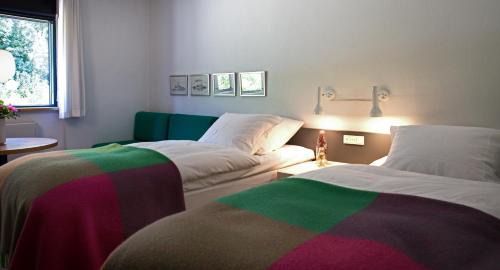 Grena Strand Hotel | Discover Kysthotellet: Oceanfront Getaway with Hot Tub