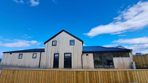 Hofsos Bed & Breakfast | Oceanfront Retreat at Lónkot: Family-Friendly Getaway