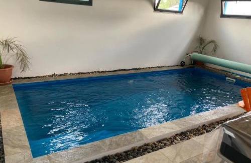 La Plaine des Cafres House | Discover Comfort at l'an dormi vacances with Pool & Hot Tub