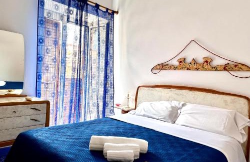Santo Stefano di Camastra Apartment | Elegant L'Antico Palazzo: Family-Friendly Retreat with 9/10 Rating