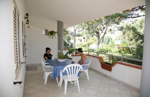 Ricadi Apartment | Discover L' Arcobaleno Resort: Oceanfront Retreat with Pool