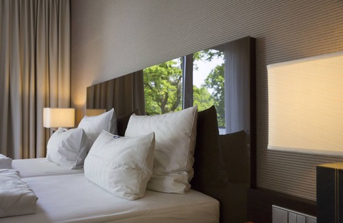 Horde Hotel | Relax at L'Arrivée Hotel & Spa: 4-Star Retreat with Pool
