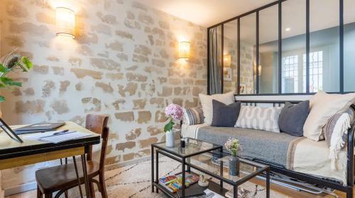 Quartier Saint-Ambroise Apartment | Family-Friendly L'Atelier Paris - 4-Star Guest Rated 10/10
