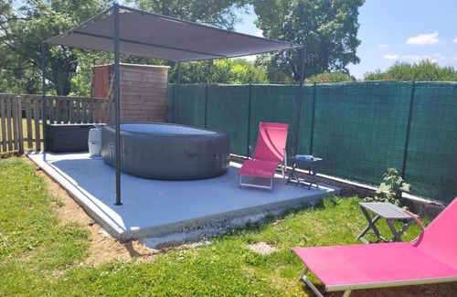 Saintes House | Relax at L'Atelier with Inviting Hot Tub Amenities