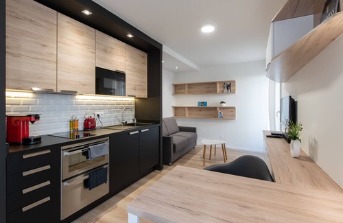 Secteur 1 Apartment | Explore Family-Friendly Comfort at L' Augustin Hotel