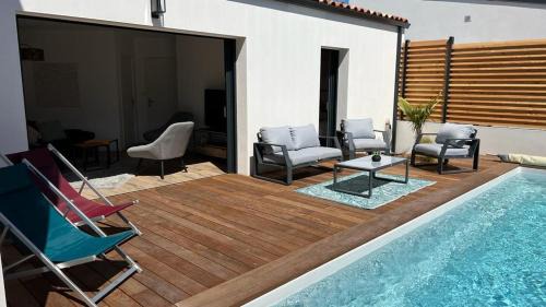 Saint-Jean-de-Monts Villa | Experience L'Ayucca: Oceanfront Stay with Pool & Top Reviews