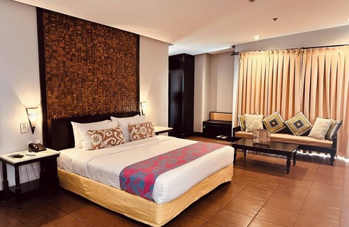 Bacolod Hotel | Discover L'Fisher Chalet: Pool, Spa & Family-Friendly Fun