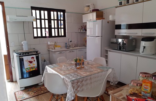 Jabaquara House | Experience L. Gael Beach House: A Family-Friendly Retreat