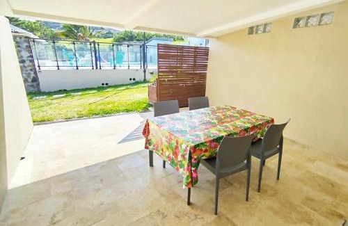 Grande Anse Apartment | Cozy Studio with Shared Pool and Oceanfront Views
