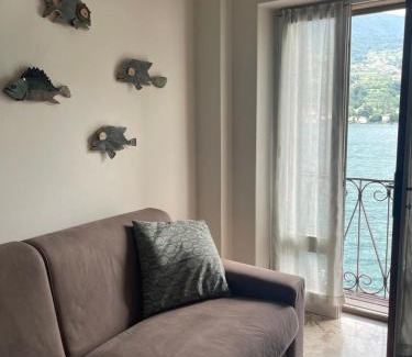 Peschiera Maraglio Apartment | Oceanfront Retreat at L'Isola dei Sapori – Guest Rated 8.2