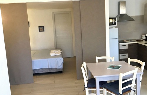 Liscia di Vacca Apartment | Relaxation Awaits at L'Olivastro Apartment with Ocean Views