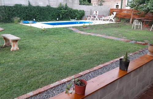 Pilar Centro House | Relax at La Amelia: Poolside Bliss with Complimentary Breakfast