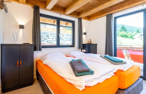Sankt Margarethen im Lungau Ski Chalet | Indulgent Chalet with Two Saunas and Hot Tubs Await