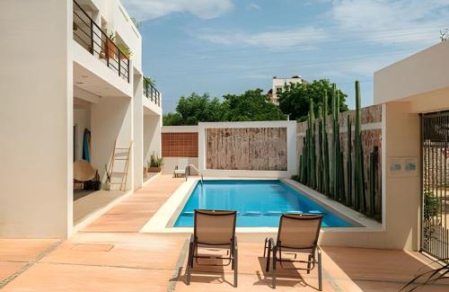 Los Tamarindos Resort | Discover La Aurora: Oceanfront Retreat with Pool Access