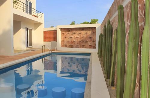 Los Tamarindos Resort | Discover La Aurora: Oceanfront Retreat with Pool Access