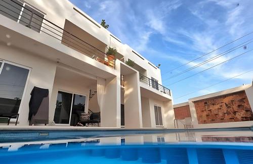 Los Tamarindos Resort | Discover La Aurora: Oceanfront Retreat with Pool Access