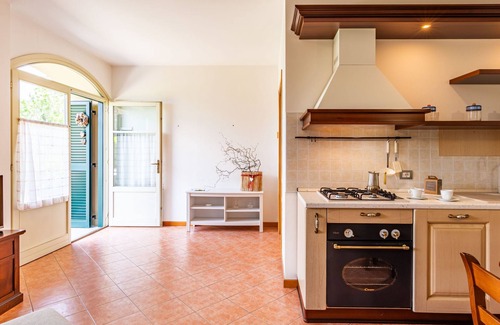 Colico Apartment | Pet-Friendly Oceanview Retreat at La Baietta by Interhome