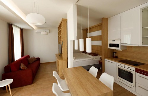 Heviz Apartment | Discover La Bella Centrum: Family-Friendly 4-Star Retreat