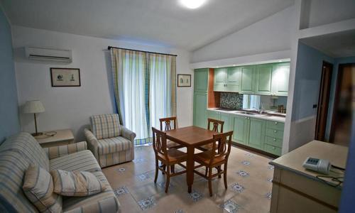 Scalea Hotel | Experience La Bruca Resort: Oceanfront Comfort & Family Fun