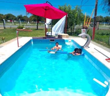Termas de Rio Hondo Apartment | Family-Friendly LA CABAÑA with Pool & Hot Tub Amenities