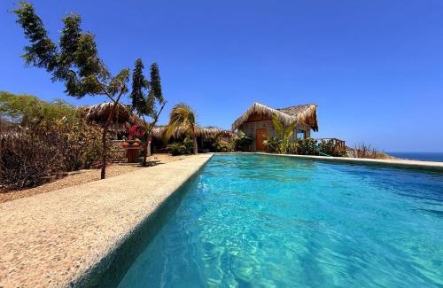 Punta Sal House | Discover La Cabaña de Iza: Oceanfront Retreat with Pool