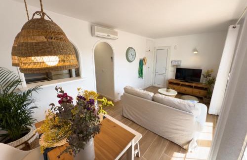 Son Parc Apartment | Atardecer Menorca: Oceanfront Haven with Pool Access