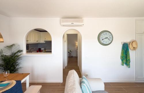 Son Parc Apartment | Atardecer Menorca: Oceanfront Haven with Pool Access