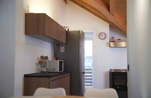 Roncone House | Explore La Casa Rossa: Family-Friendly with Breakfast Included