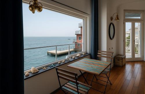 Posillipo Apartment | Experience LA CASA SULL'ACQUA: Pet-Friendly & Family Fun