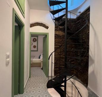 Ano Siros Apartment | Cozy La Casa Verde: Child-Friendly with 8.5/10 Rating