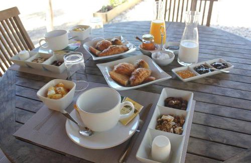 South Province Ski Chalet | Experience La Case: Oceanfront Retreat with Spa Amenities