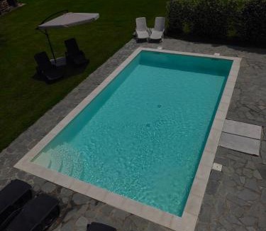 Pombia Apartment | Discover La Casetta: Oceanfront Paradise with Pool Access