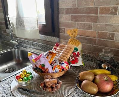 San Nicolo d'Arcidano Apartment | La Casetta: Guest Rated 10/10 with Cozy Fireplace & Hot Tub