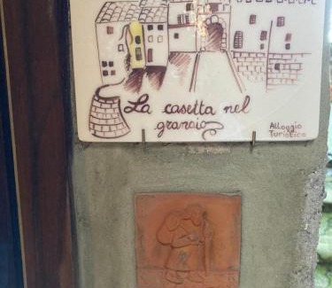 Capranica Apartment | Charming La Casetta nel Granaio: Rated 9.3/10, Family & Pet-Friendly