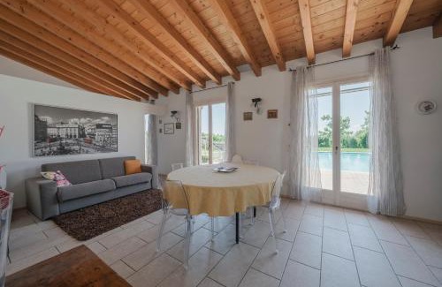 Pozzolengo Apartment | La Casina Apartment: Garden Oasis with Pool & Ocean Views